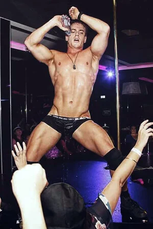 Hens knights male entertainer performing on stage