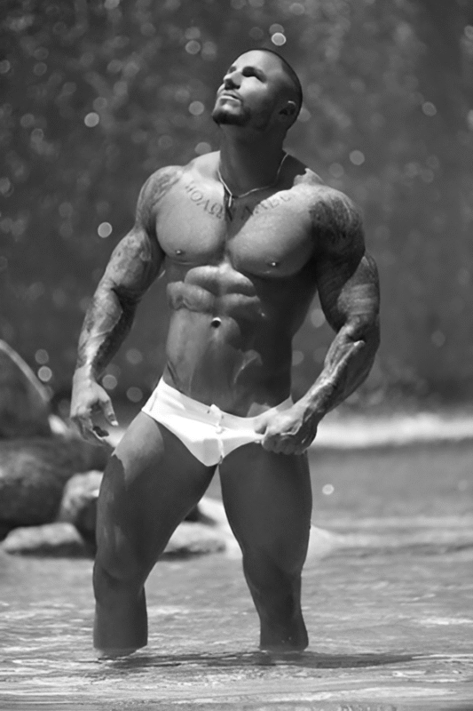 Male stripper from Hens Knights posing in water