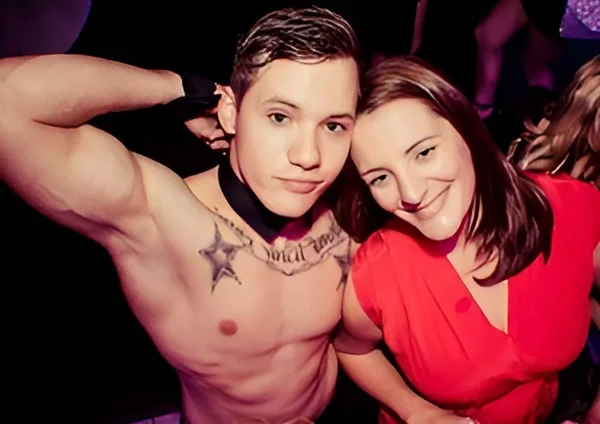 Hens Knights male stripper posing with guest